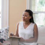 A picture containing window, indoor, person Description automatically generated